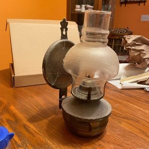 Visage wall hanging oil lamp